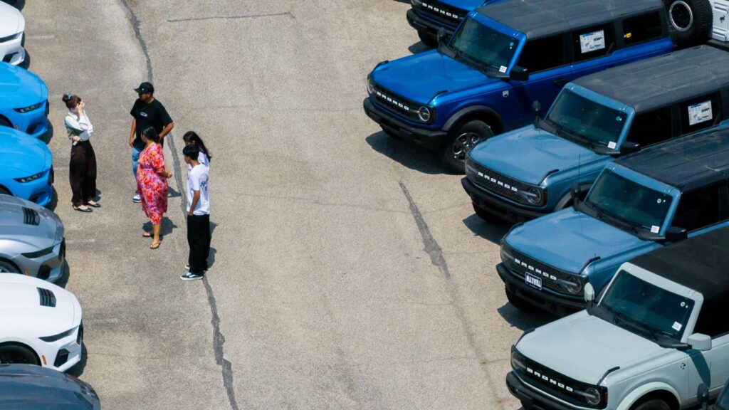 Car purchases rise, consumer spending slows