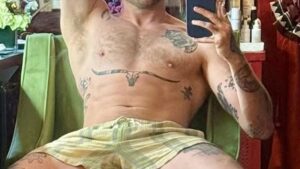 Guess the Shirtless Singer in This Grizzly Shot