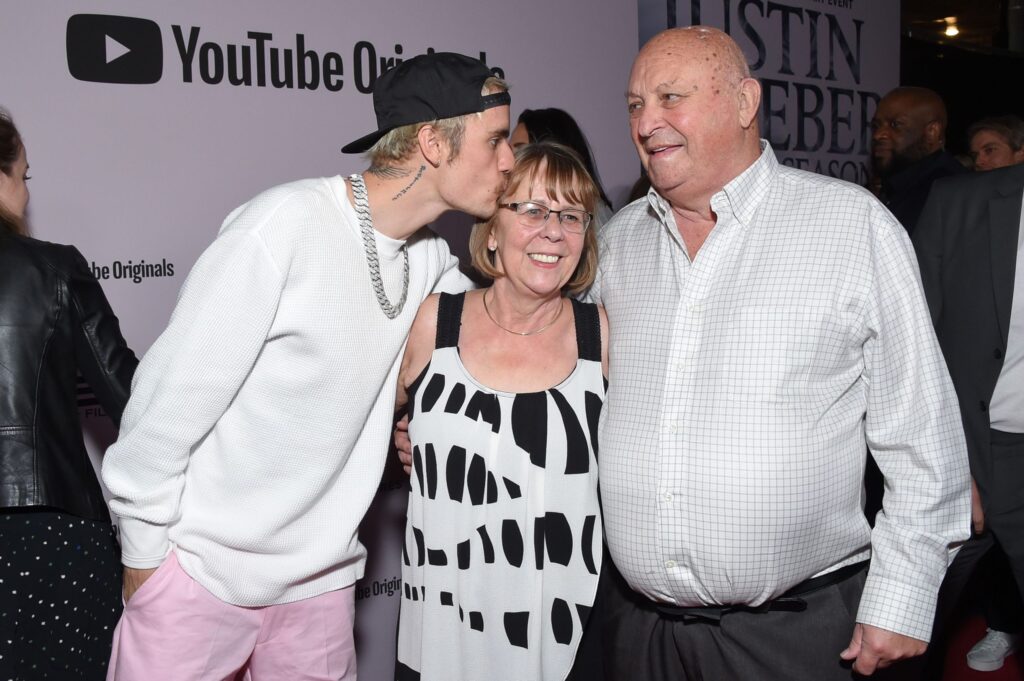 Justin Bieber Mourns Grandfather Bruce Dale's Passing: A Touching Tribute to Family Legacy Canadian singer Justin Bieber, grandparents Diane Dale and Bruce Dale arrive for YouTube Originals