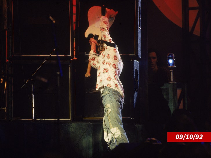 Kurt Cobain Smashed Guitar Auction Nets Over $100K for Iconic Nirvana Artifact Kurt Cobain performing with Nirvana during their 1992 European tour