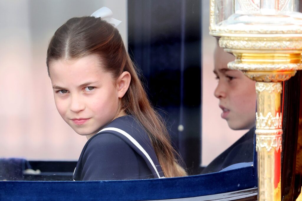 Princess Charlotte of Wales and Prince George of Wales during Trooping the Colour at Buckingham Palace on June 15, 2024 in London, England.