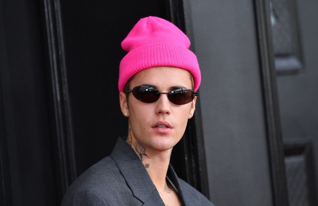 Justin Bieber Spending Habits Alarm Friends: Reports of $300K Splurges and Private Jets Justin Bieber arrives for the 64th Annual Grammy Awards