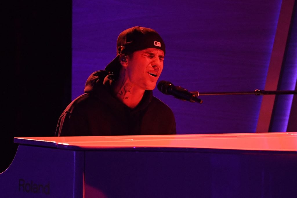 Justin Bieber Spending Habits Alarm Friends: Reports of $300K Splurges and Private Jets Justin Bieber performs at the 64th Annual Grammy Awards