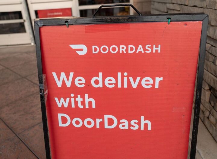 Sign reading We Deliver With Doordash, referencing the Doordash food delivery service, San Ramon, California, September 12, 2020. (Photo by Smith Collection/Gado/Getty Images)